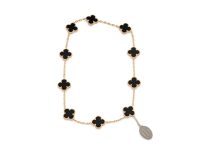 Van Cleef & Arpels — брошь желтое золото/оникс